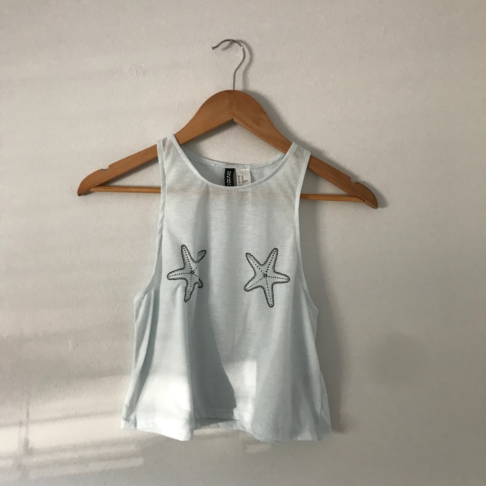H&M blue tank top with stars size XS